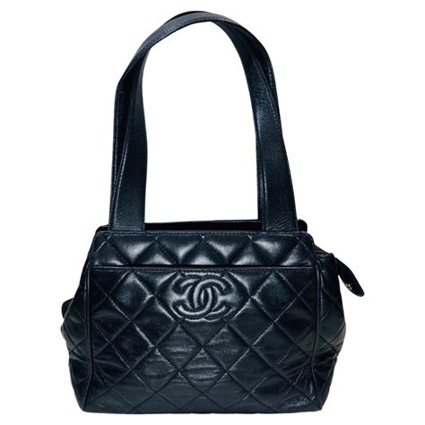 chanel embossed logo purse blue|chanel handbags for men.